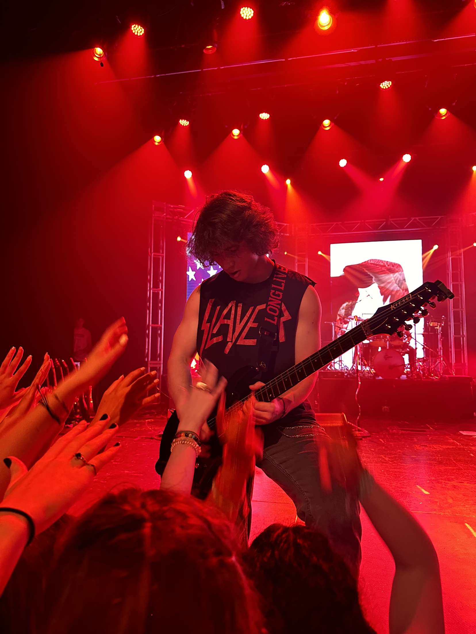 (Me playing guitar for my senior year concert)